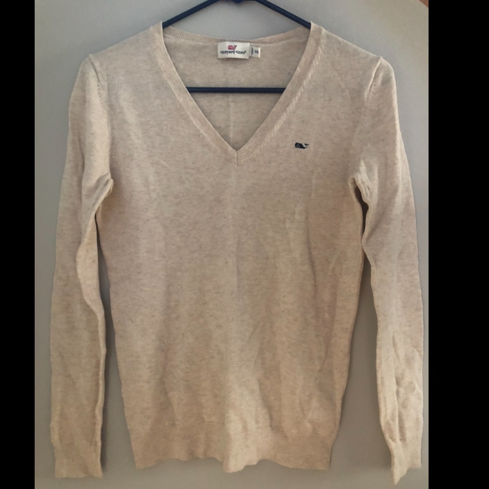 Tan V-neck sweater